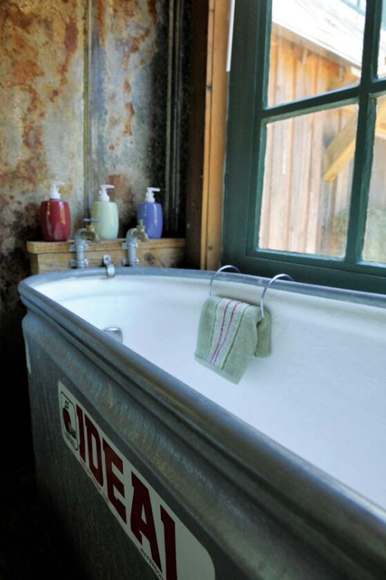This bathtub cost $90: $50 for the cattle trough and $40 to have a fiberglass lining installed.